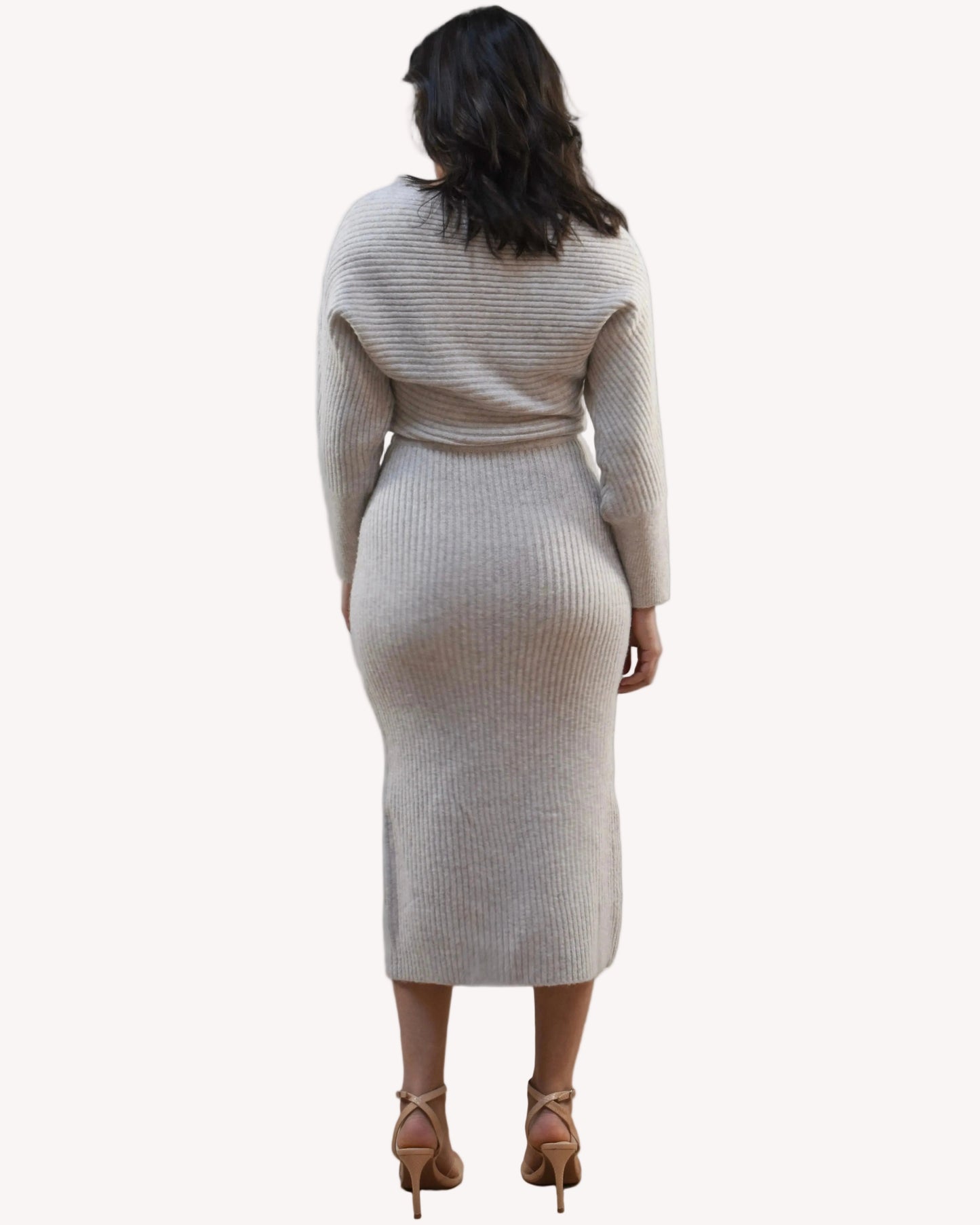 Midi one-shoulder sweater dress on soft linen background, featuring soft stretchy knit and elegant silhouette.