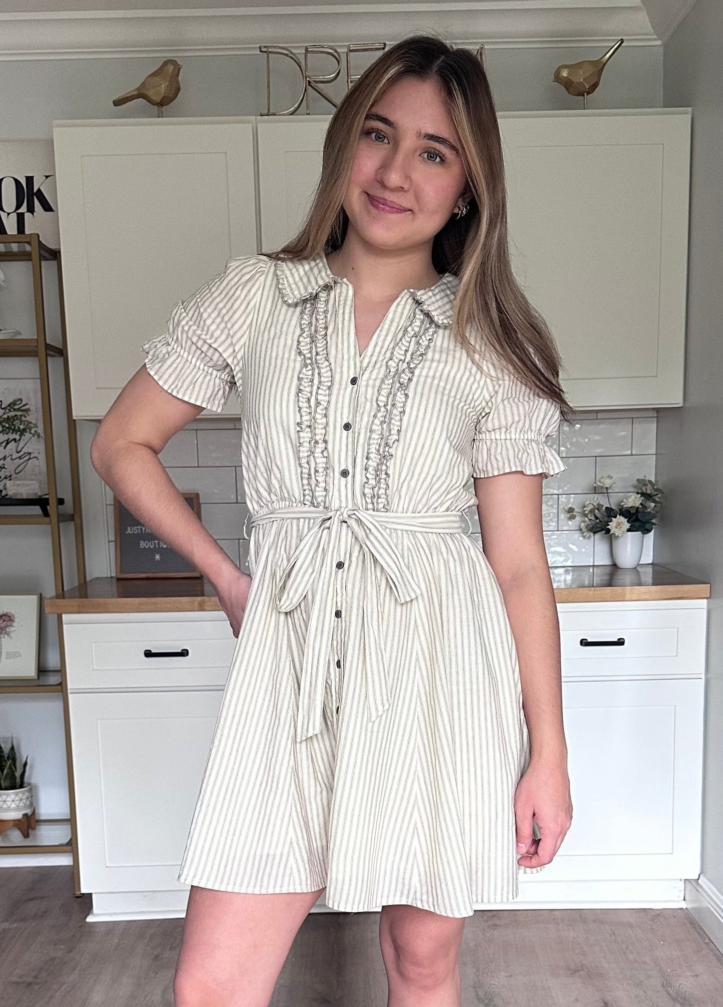 Close-up of the Ruthie mini dress ruffled doll collar with delicate embroidered trim