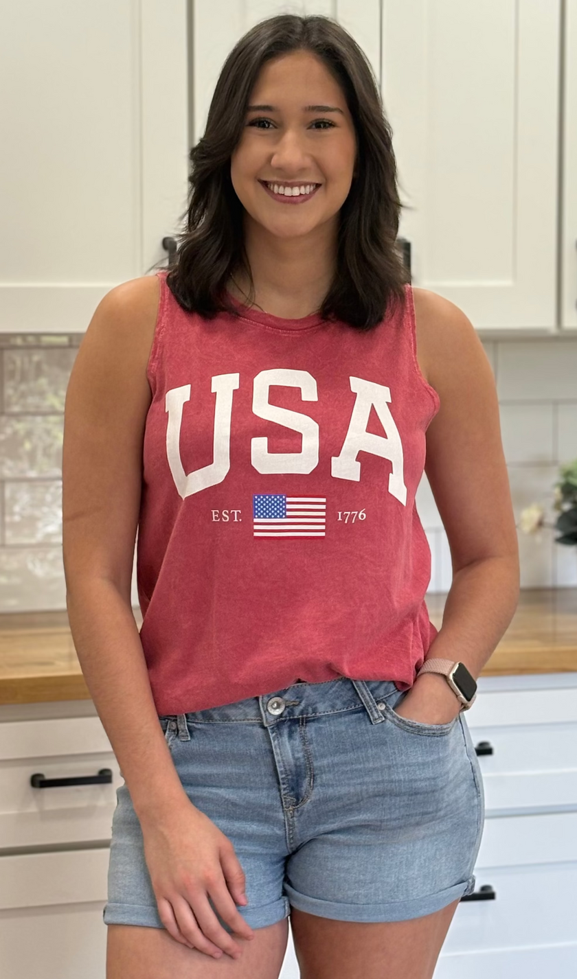 Vintage red mineral-wash “USA EST. 1776” graphic tank in soft cotton with relaxed fit and patriotic design