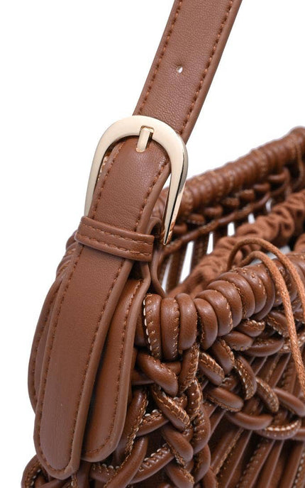 Close-up of the sculpted crescent silhouette, focusing on the high-quality woven pattern and structured base construction.