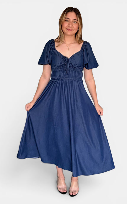 Casual French blue midi dress with side pockets, sweetheart neckline, and breathable Tencel fabric.