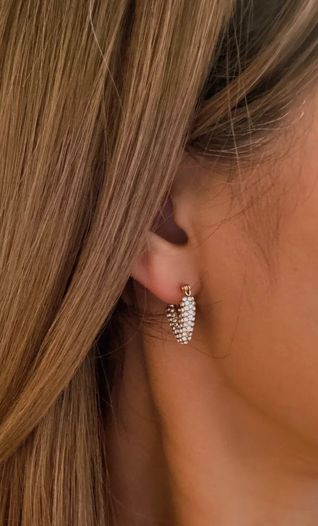 Close-up of Aurora V-Hoop Earrings in 18K gold-plated stainless steel, featuring a sleek geometric V-shape design with a polished, water-resistant finish.