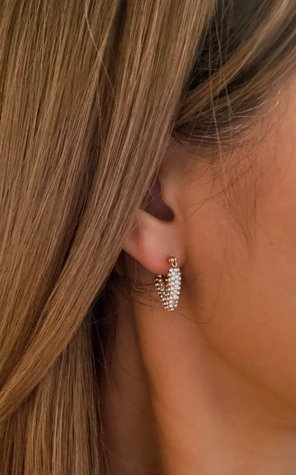 Close-up of Aurora V-Hoop Earrings in 18K gold-plated stainless steel, featuring a sleek geometric V-shape design with a polished, water-resistant finish.