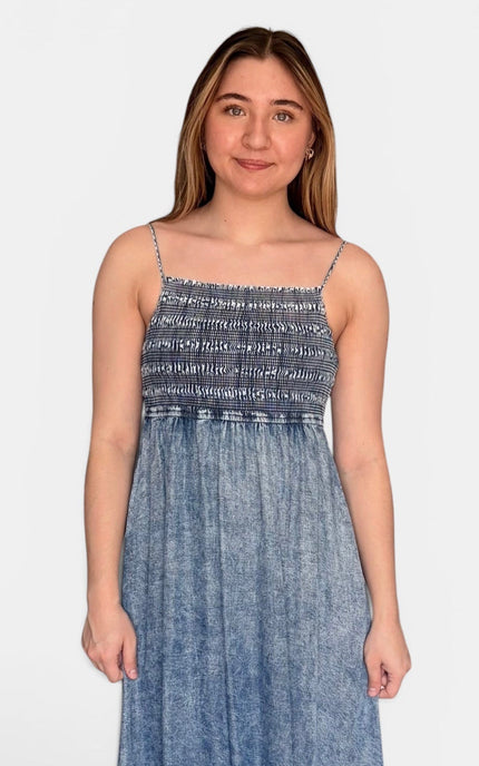 Blue tiered midi dress crafted from 100% Tencel with a relaxed, flowy silhouette.