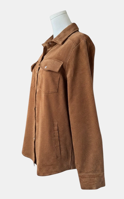 A brown corduroy utility jacket displayed on a white mannequin torso against a light gray background.