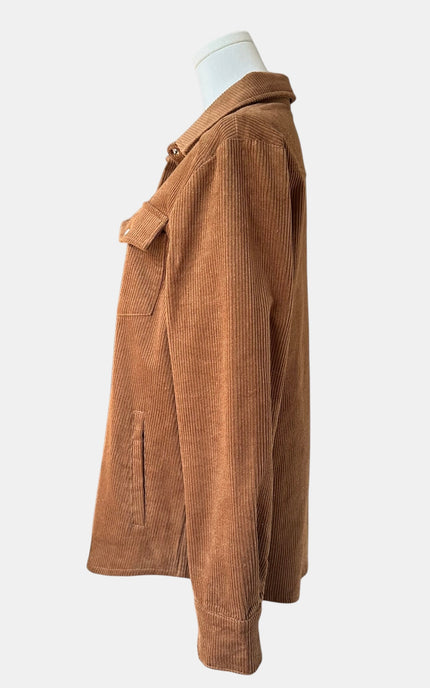  brown corduroy button-up shirt jacket with two chest flap pockets, displayed on a white mannequin torso against a light gray background.