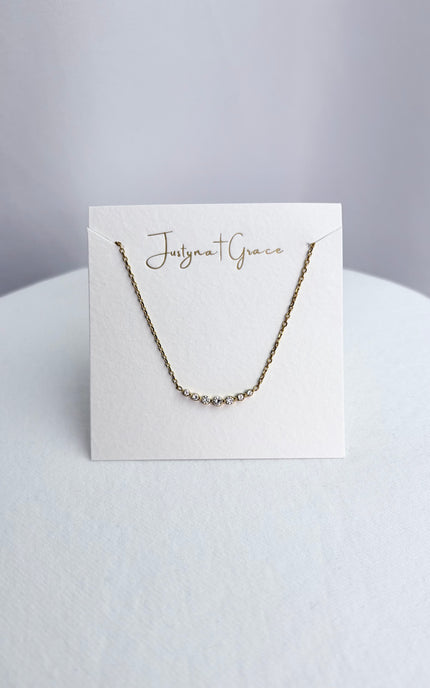 Necklace presented on a display card for a clean, gift‑ready look.