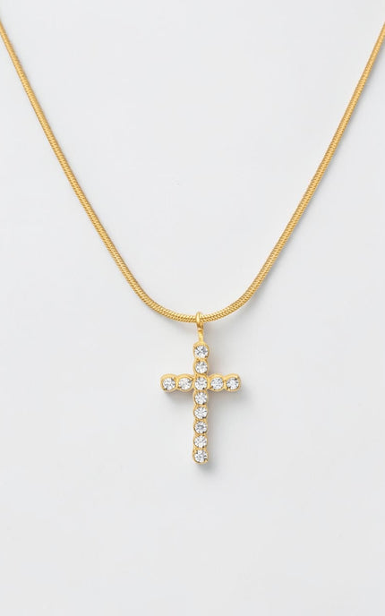 Gold cross necklace with crystal accents and a minimalist everyday design.