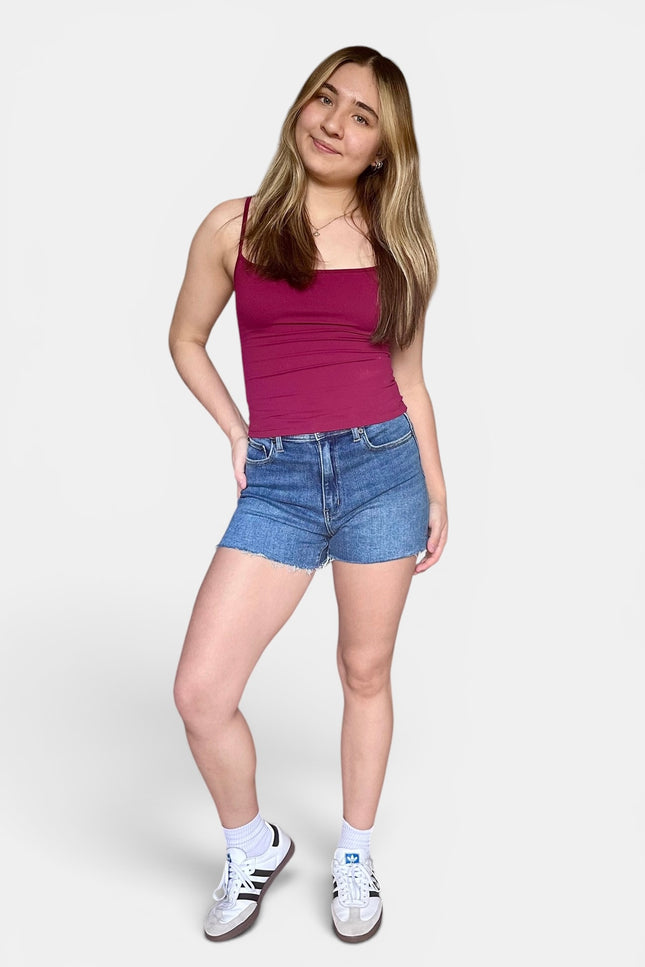 Medium-wash jean shorts with soft stretch denim and a relaxed, comfortable fit.