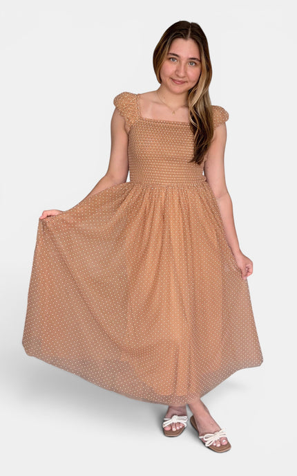  Swiss dot midi dress with a smocked bodice and flutter cap sleeves