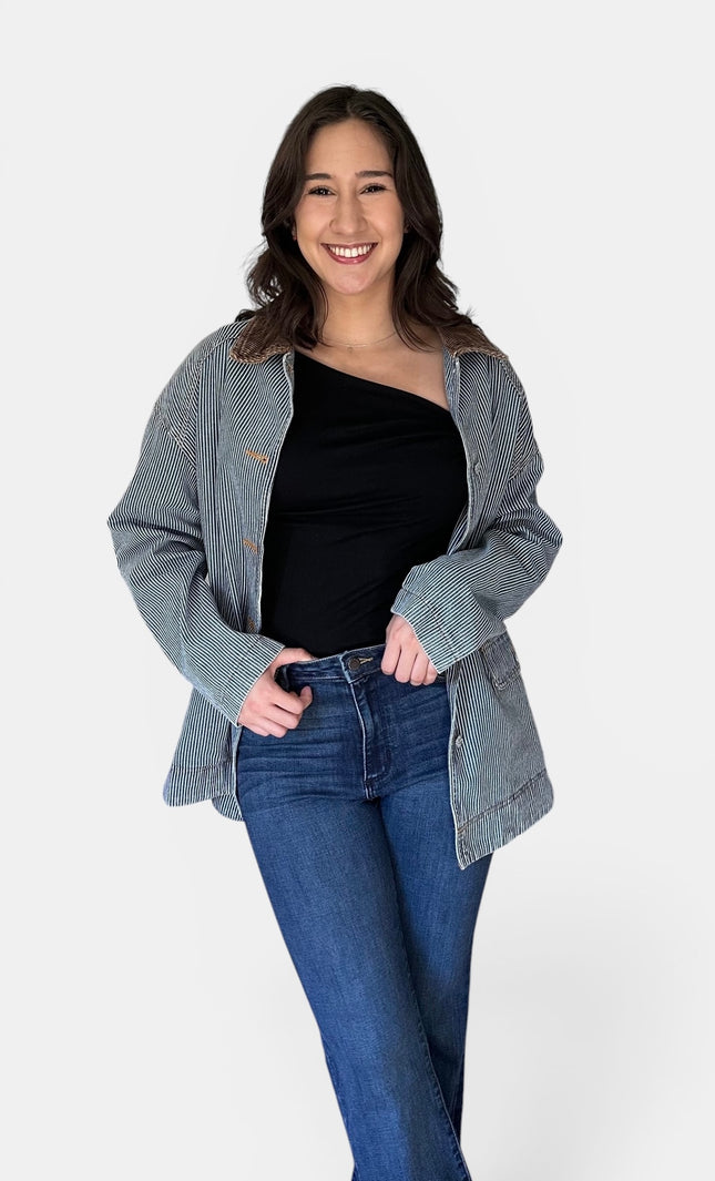 Women's relaxed fit denim jacket with contrasting corduroy collar.