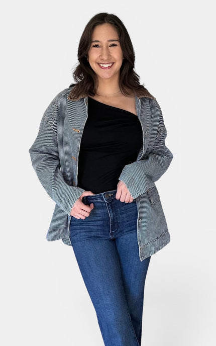 Women's relaxed fit denim jacket with contrasting corduroy collar.