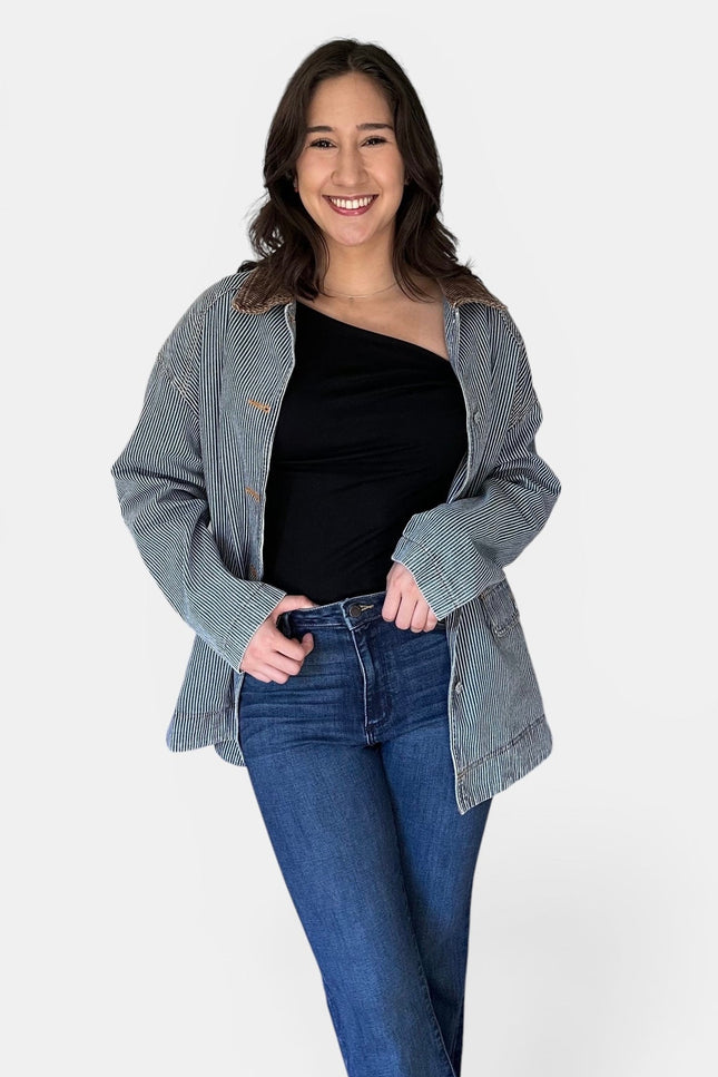 Women's relaxed fit denim jacket with contrasting corduroy collar.