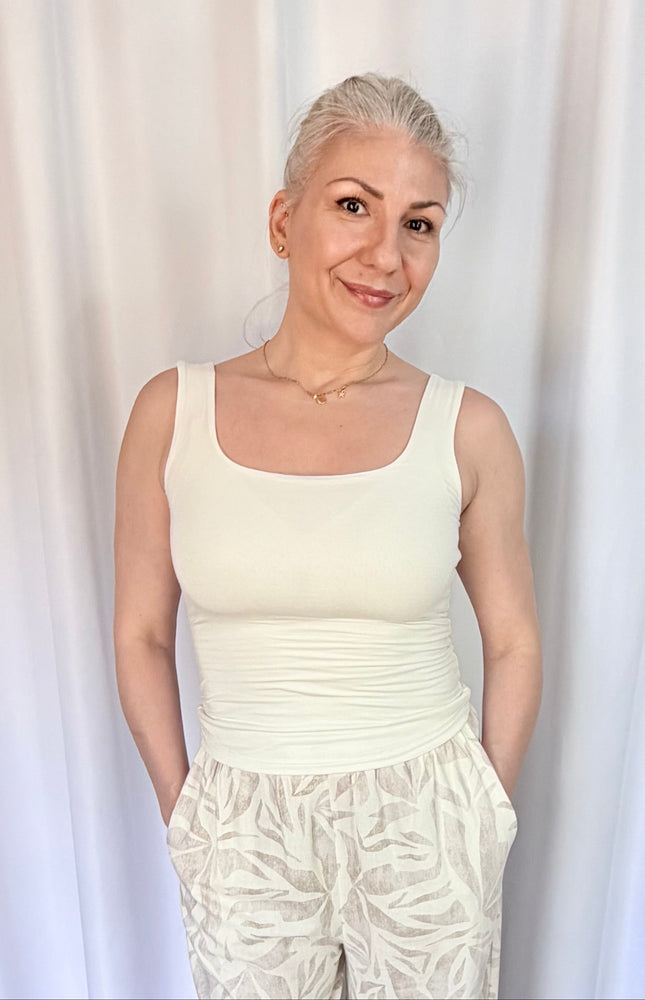 Women's buttery soft double-layer square neck tank top in front view with fitted silhouette.