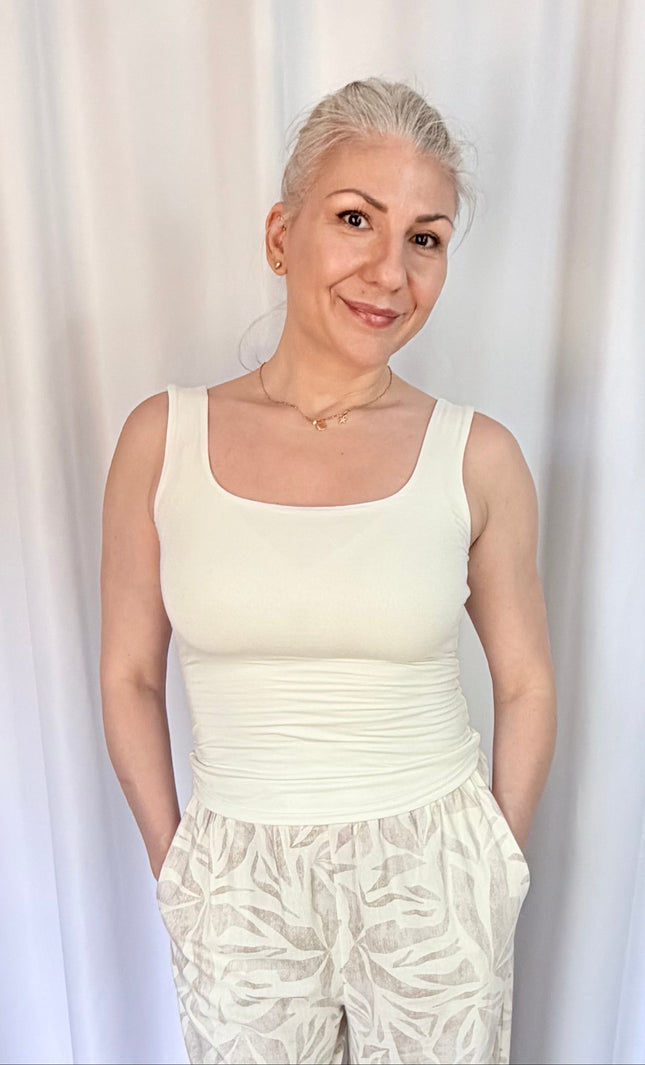 Women's buttery soft double-layer square neck tank top in front view with fitted silhouette.