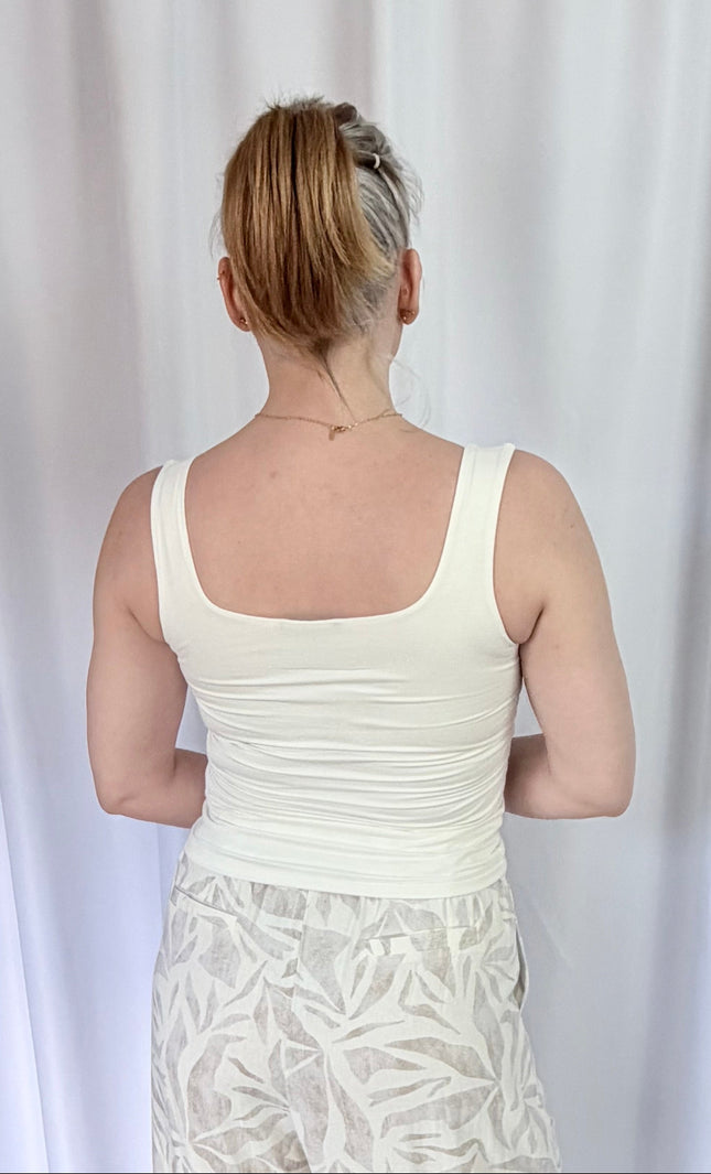 Back view of fitted double-layer rayon spandex tank top with smooth seamless finish.