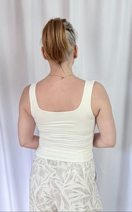 Back view of fitted double-layer rayon spandex tank top with smooth seamless finish.