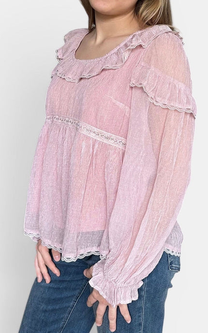 Side view of romantic peasant blouse with long puff sleeves.