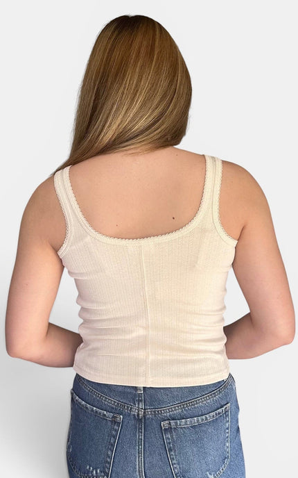 Back of cream pointelle knit tank top for women front view