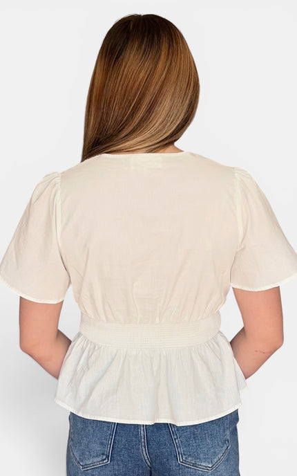 Eyelet cotton top with V-neckline and flattering fit