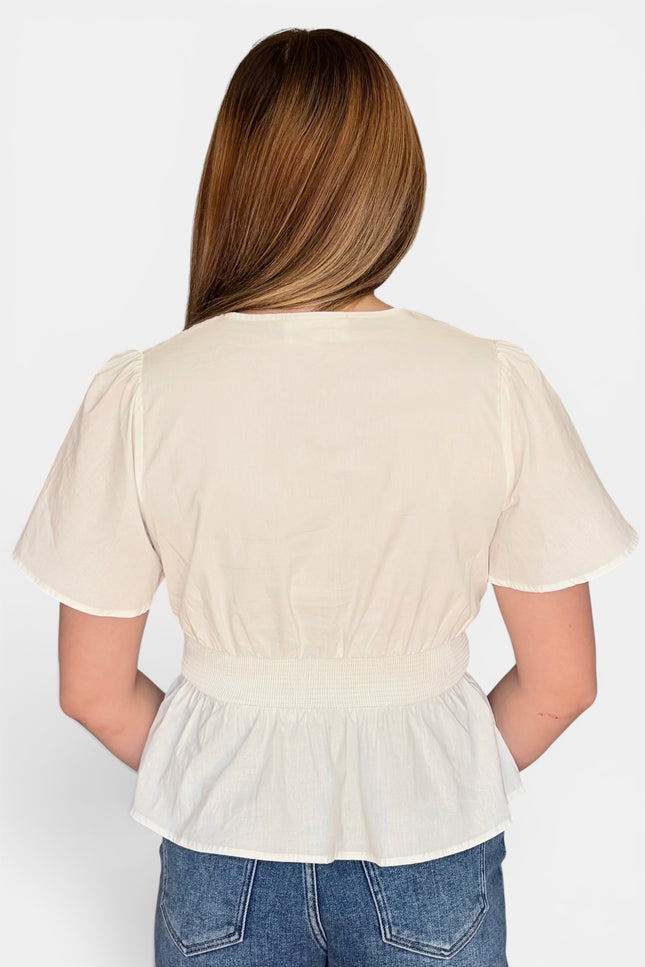Eyelet cotton top with V-neckline and flattering fit