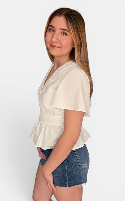 Women's white cotton blouse with flare sleeves