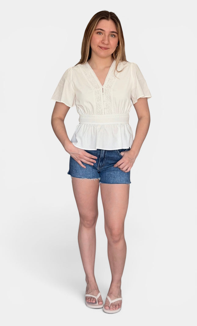 Women's cotton eyelet blouse with short flare sleeves