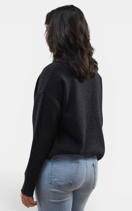 Black long sleeve mock neck sweater in a comfortable wool blend knit.