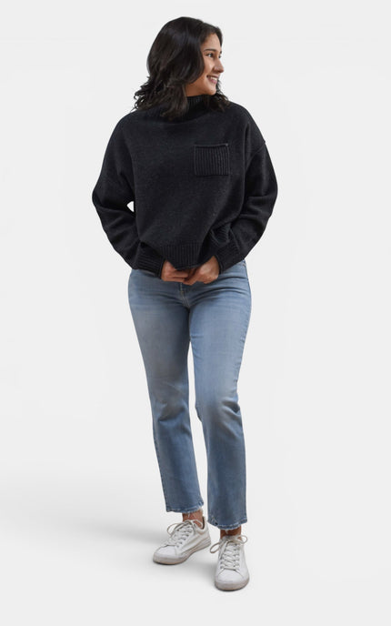Women's black long sleeve sweater top with a refined minimalist style.