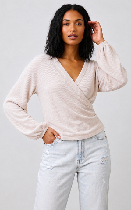 Front view of women's brushed ribbed surplice top with wrap neckline.