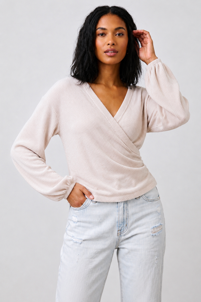 Front view of women's brushed ribbed surplice top with wrap neckline.