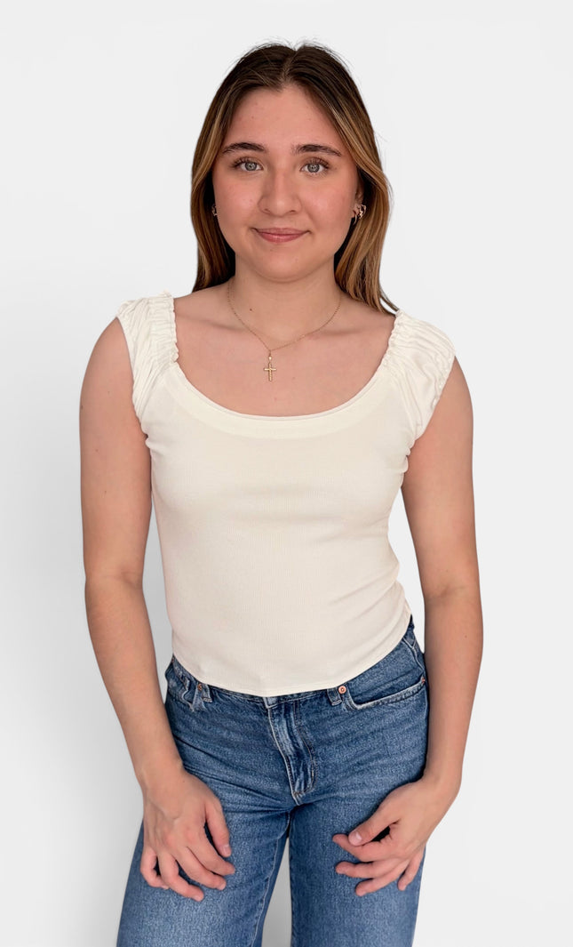 Fitted ribbed tank with scoop neckline, ruched straps, and soft cotton-spandex stretch
