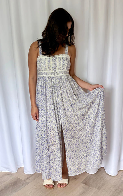 Flowing skirt of the floral maxi dress shown in motion.