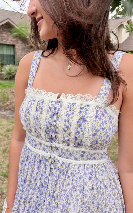 Close‑up of the functional button‑down front with covered buttons.