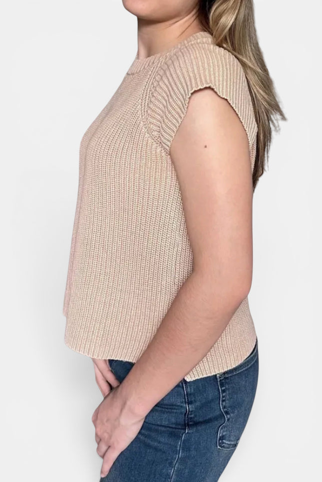 Beige ribbed knit sleeveless top with cap sleeves and blue jeans, shown from a side profile against a light gray background.