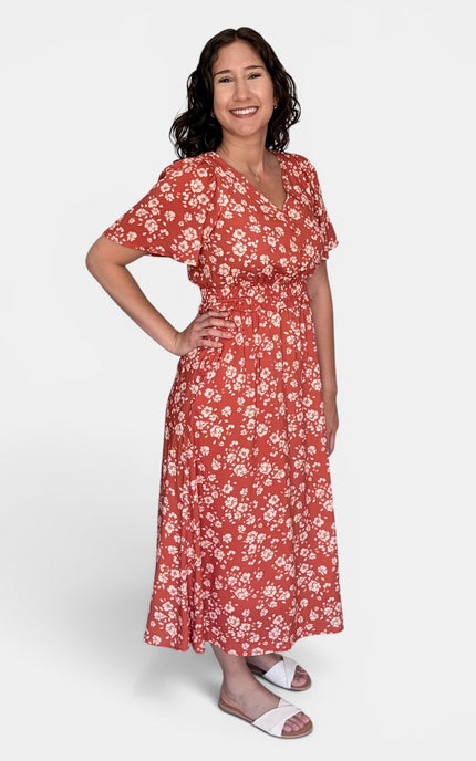 Feminine floral midi dress with flutter sleeves and midi length
