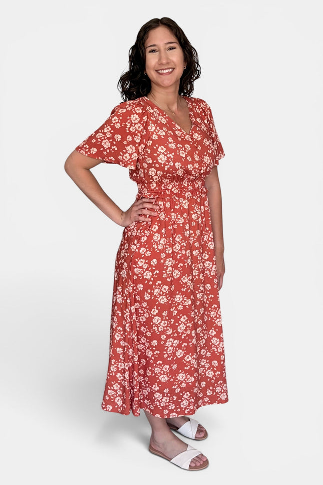 Feminine floral midi dress with flutter sleeves and midi length