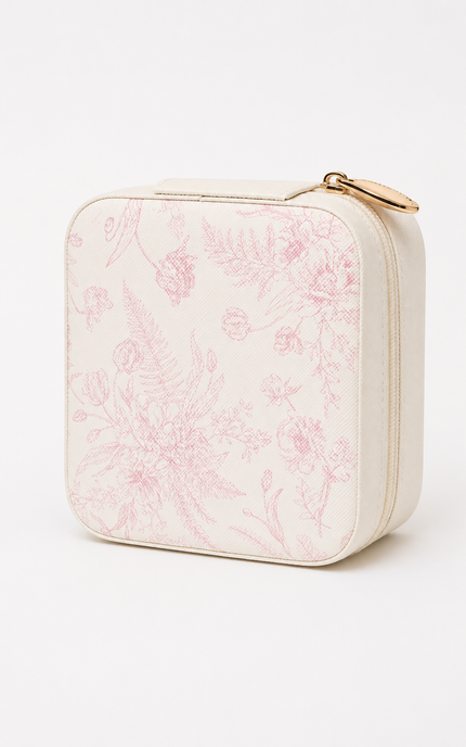 A square cream-colored zippered pouch featuring a delicate pink botanical floral pattern, with a small gold zipper pull, shown on a clean white background.