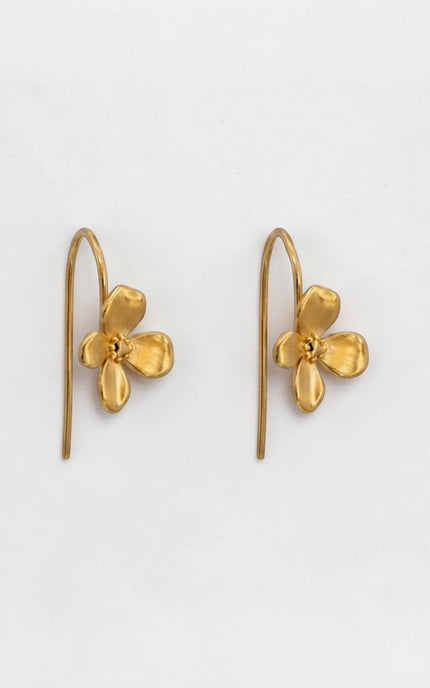 Flat lay view of the 18k gold PVD plated stainless steel floral earrings, neatly styled to show the exact scale of the 10.3mm charms.
