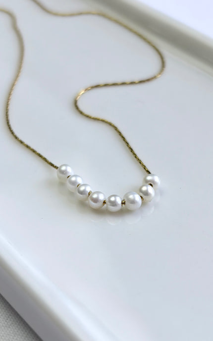 Freshwater pearl necklace with 18k gold PVD chain, lightweight, hypoallergenic, and tarnish‑resistant.