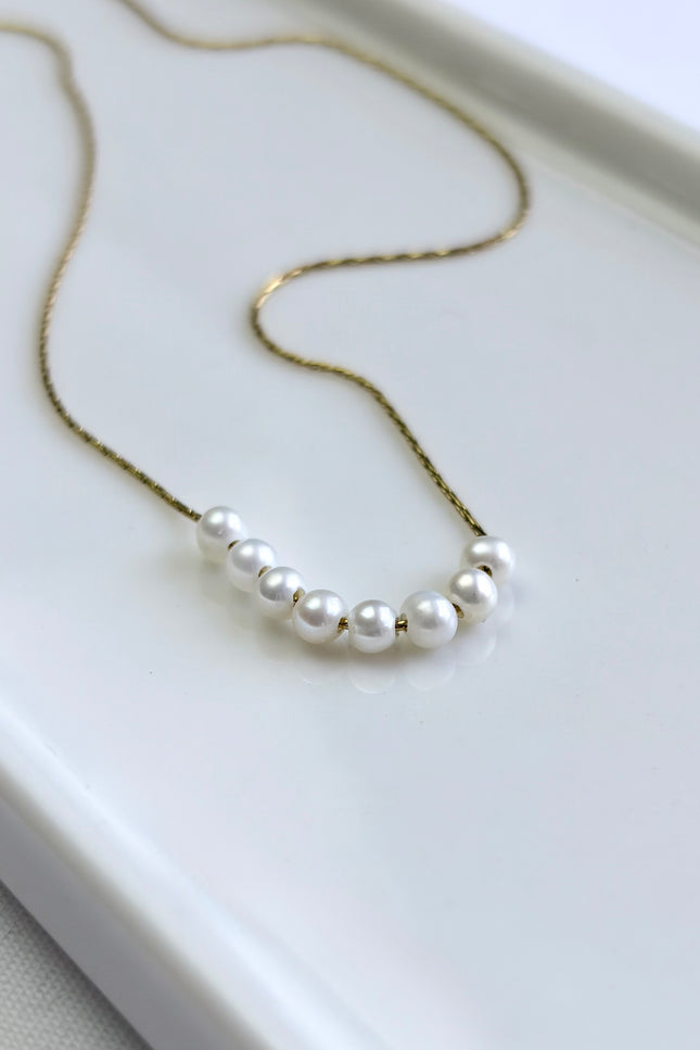 Freshwater pearl necklace with 18k gold PVD chain, lightweight, hypoallergenic, and tarnish‑resistant.