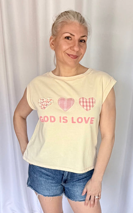 Comfortable cotton-blend top featuring vintage-style "God Is Love" patchwork details.