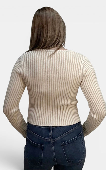 Back view of a fitted ribbed V-neck cardigan with button closure and long sleeves in muted mauve
