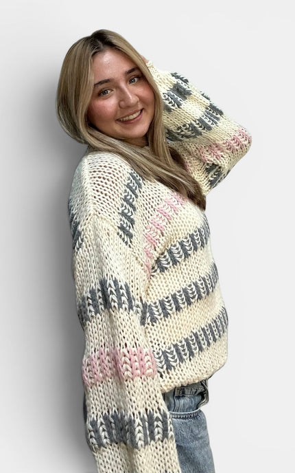 Relaxed fit striped sweater in ivory multi with a chunky textured knit.