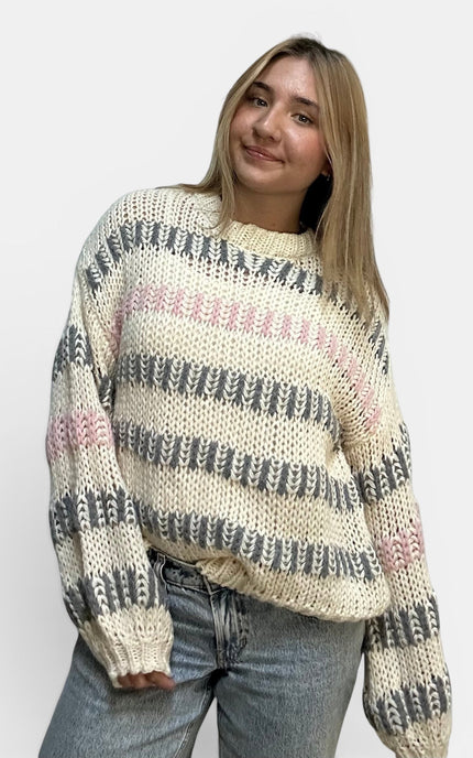 Ivory multi stripe pullover sweater styled with denim for a casual fall outfit.