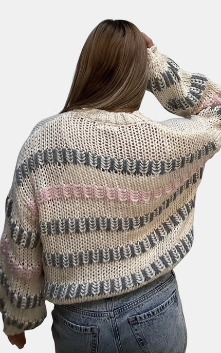 Women's chunky knit striped sweater featuring an oversized cozy silhouette.