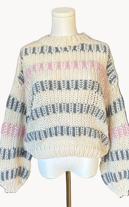 Ivory multi chunky stripe sweater with drop shoulders and voluminous sleeves, textured knit, photographed on a Soft Linen background for Justyna Grace Boutique.