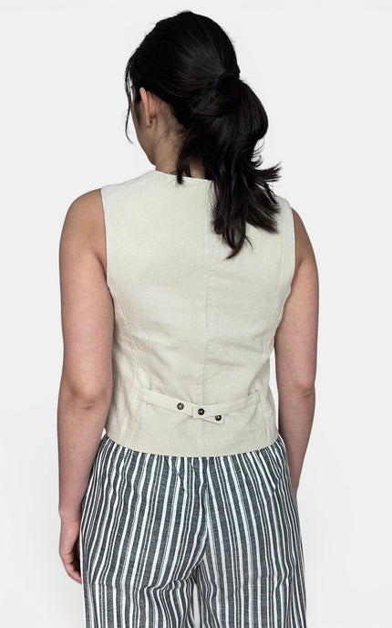 Back view of linen cotton vest with adjustable button-tab waist