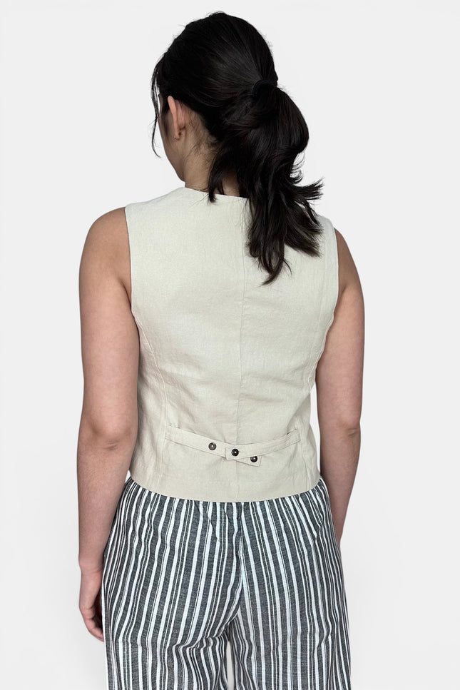 Back view of linen cotton vest with adjustable button-tab waist