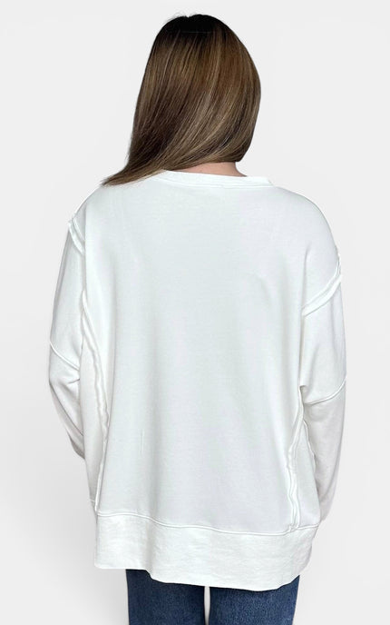 Back of soft French terry sweatshirt with ribbed hems and side slits